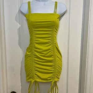 Bright green bow mini dress